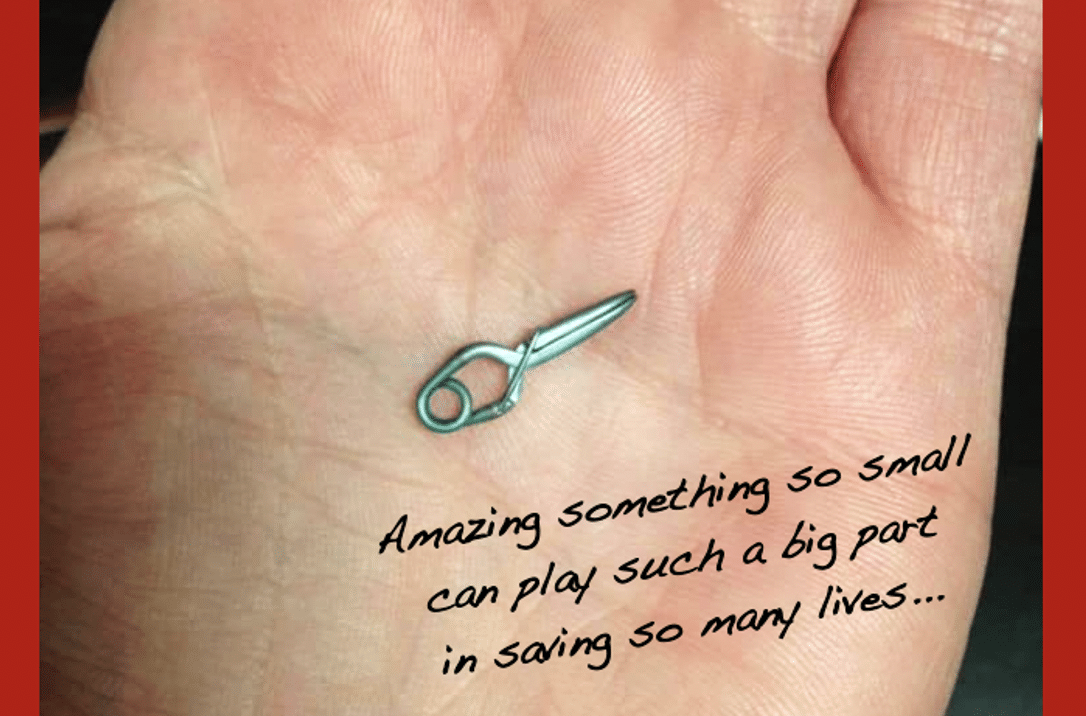 Brain aneurysm clip in a hand