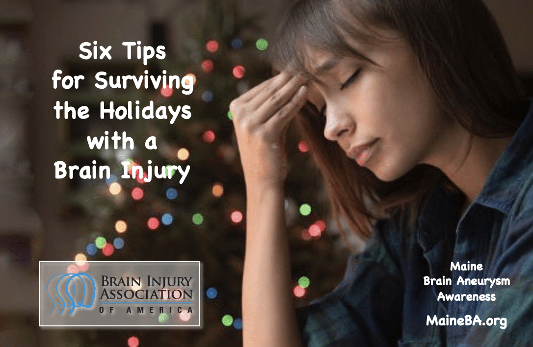 Woman holding head during holidays with brain injury