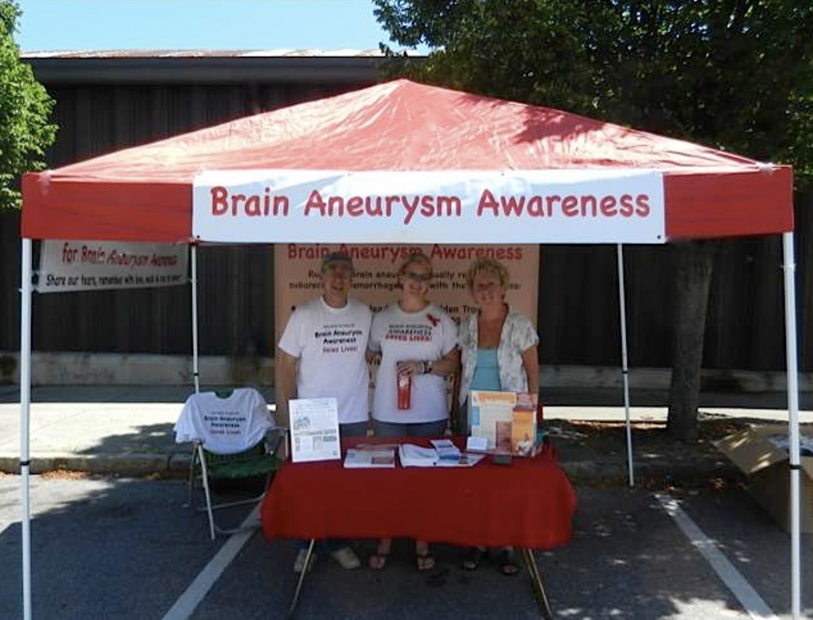 Brain aneurysm table at hockey fundraiser event