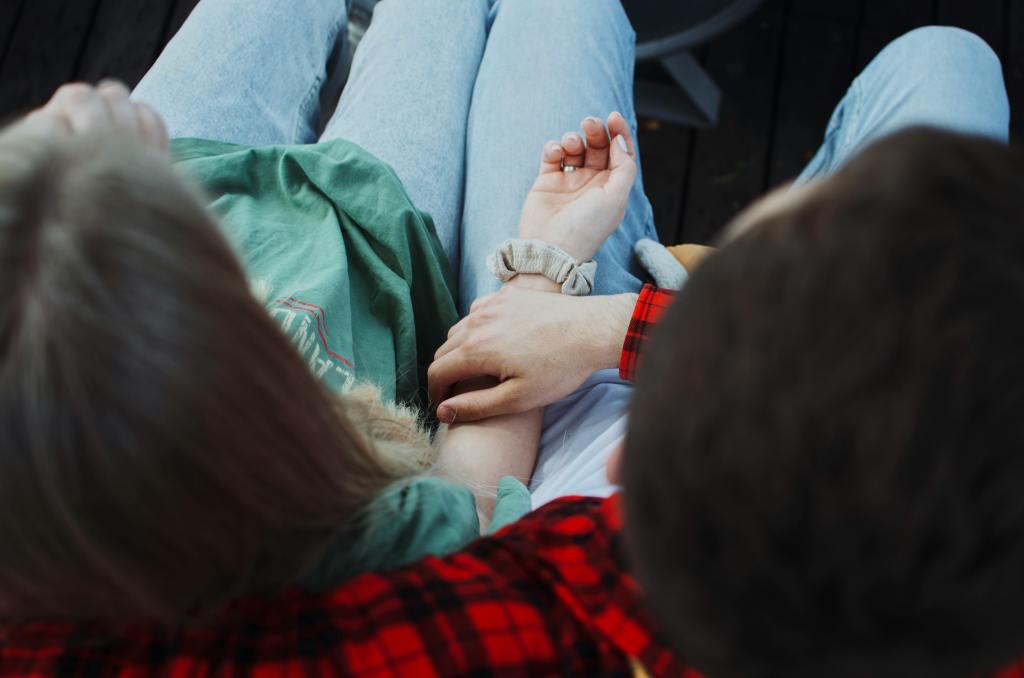 hands holding lower arm